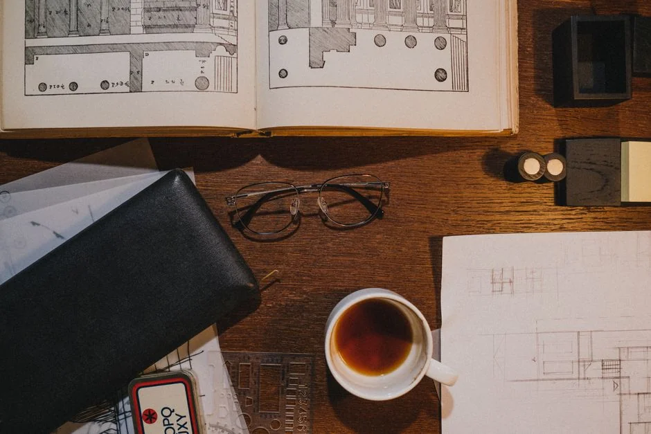 A well-organized design workspace with dual monitors and design software on display.